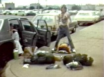 Danny Wyatt, standing, and Ronnie Wyatt in the car at the airport heading to Turkey
