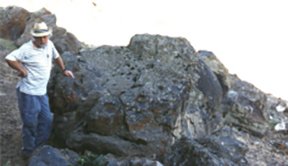 The large stone Ron believed might have seen used for slaughtering the sacrifice and bleeding out all the blood.