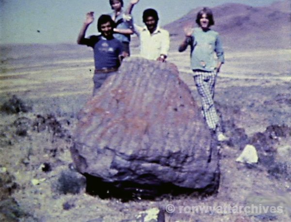 A frame from Ron's 1977 8mm film of Ronnie and Danny by the giant bark on the way into the village called the "place of the 8".