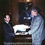 Ron is congratulated by the Governor of Agri when the decision that Noah's Ark is authentic.