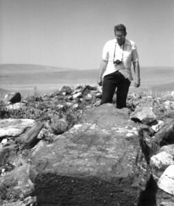 Dr. Bill Shea examining one of the drogue stones in 1985