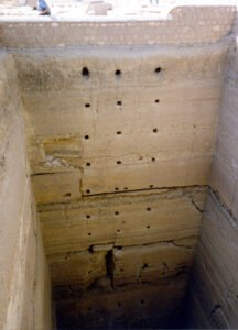 Same bin as above, showing the depth and the movable stones in the bottom to open it for more grain to flow in. (© Mary Nell Lee)