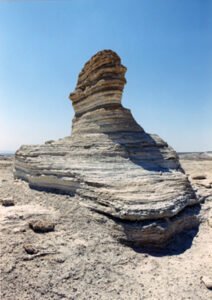 A sphinx shaped object sets alone on the north side of the wall (© Mary Nell Lee)